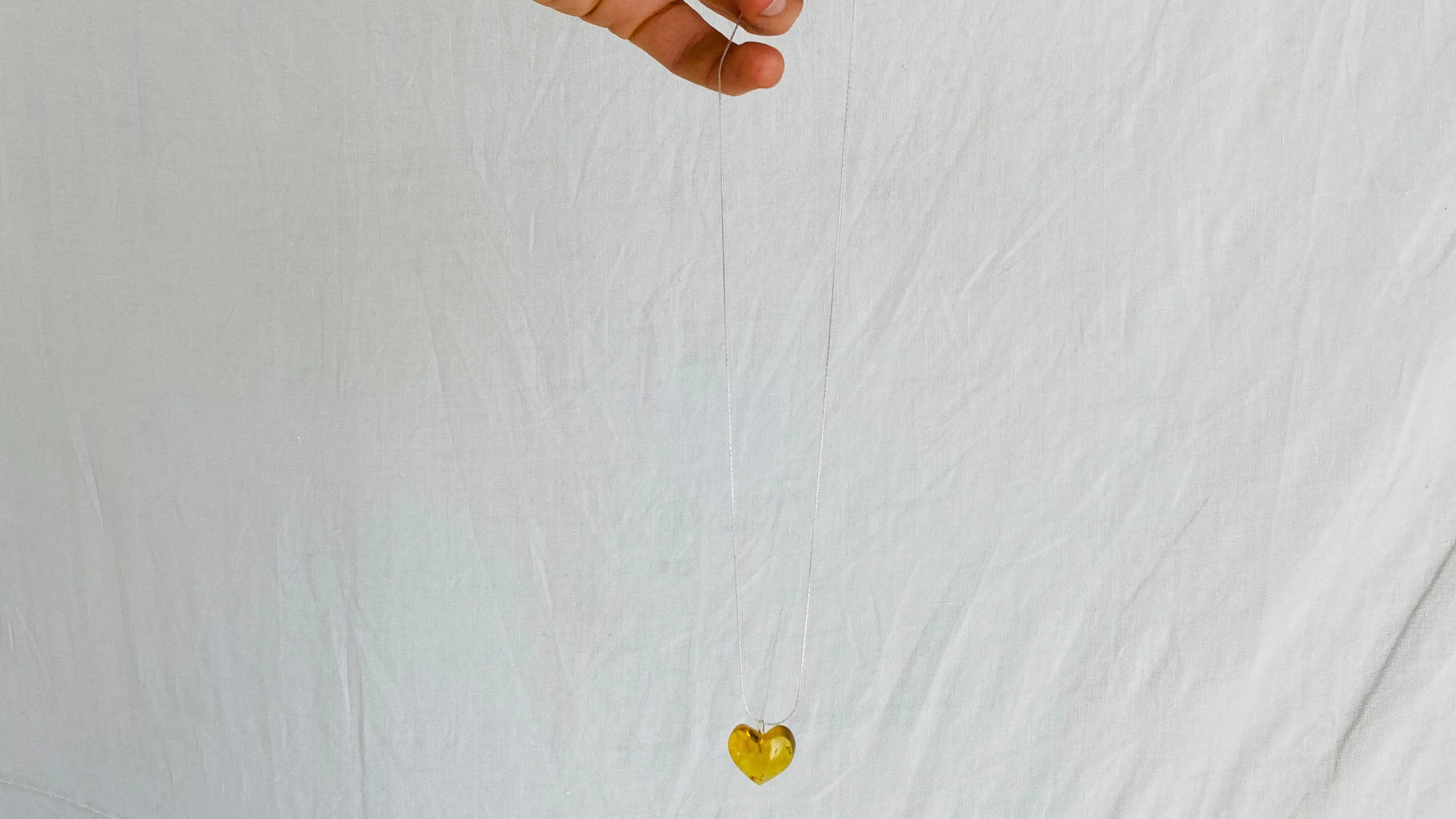 Amber Heart Pendant on a Silver Chain. Atelier Aadya