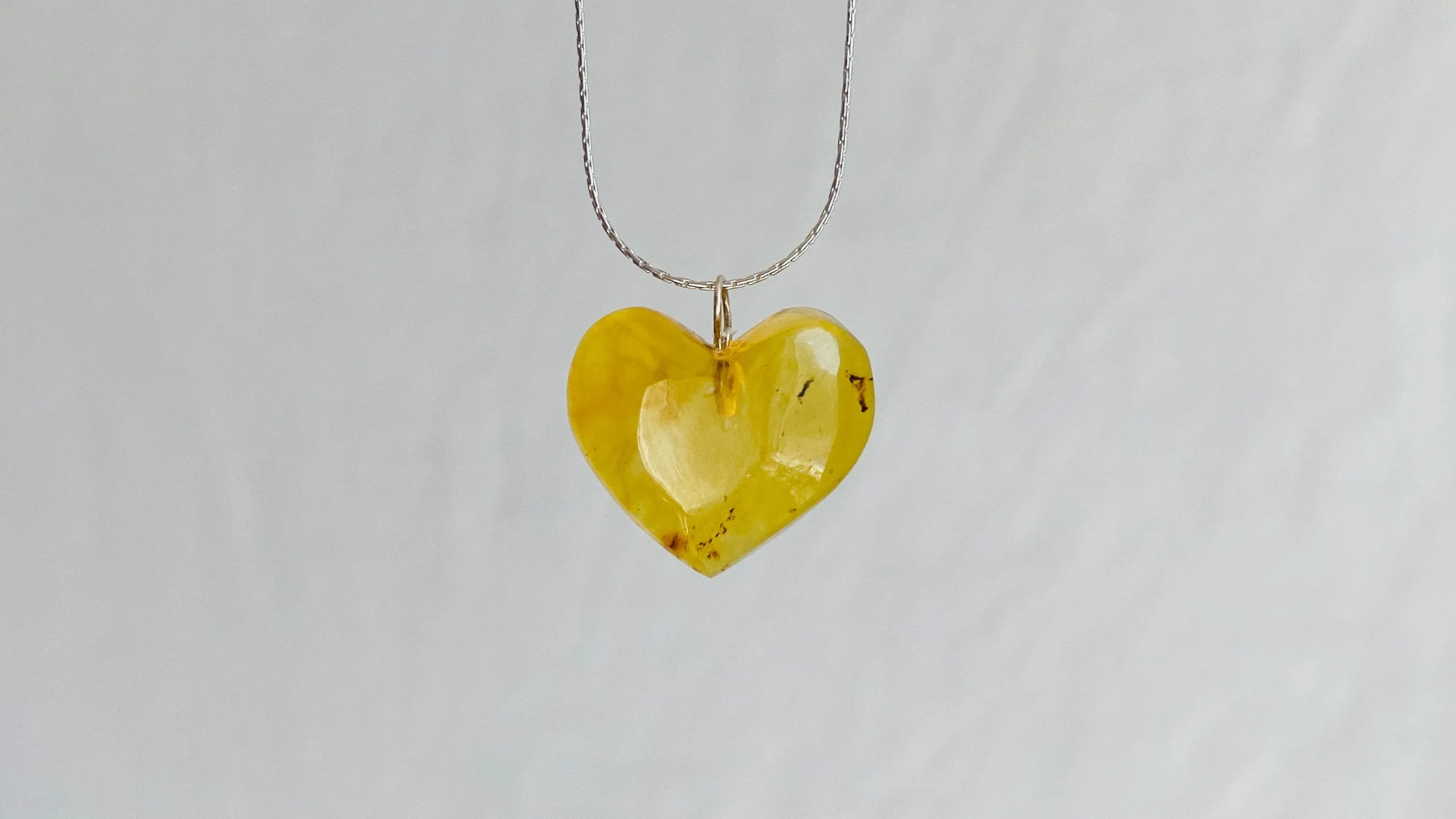 Amber Heart Pendant on a Silver Chain. Atelier Aadya